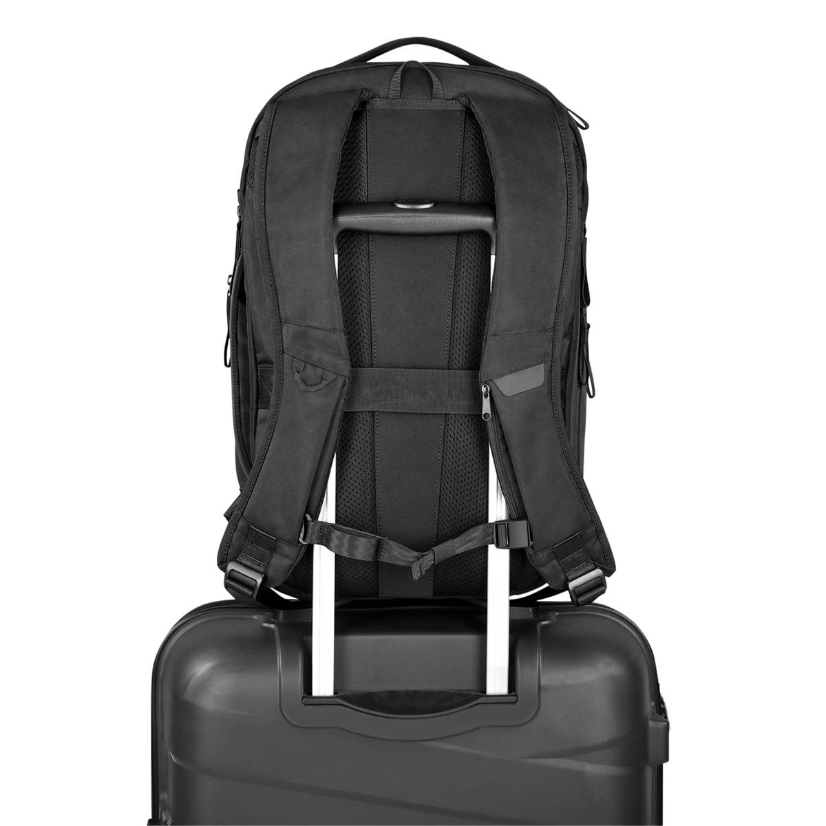 Black backpack on top of a black suitcase with a white background